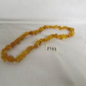 A butter amber necklace.