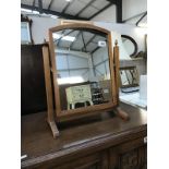 A dressing table mirror