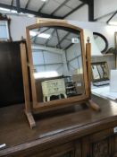 A dressing table mirror