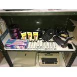 A box of hairstyling items
