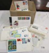 A box of first day covers, most with slogans.