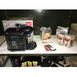 A Tassimo Vivy 2 One Button coffee maker and 47 coffee pods (as new)
