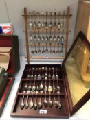 A cased lot of collectable spoons and I other lot