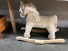 A rocking horse with sound effects