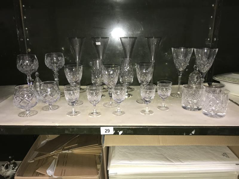 A quantity of crystal drinking glasses etc.