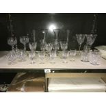 A quantity of crystal drinking glasses etc.