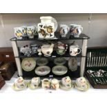 3 shelves of kitchen ware including chicken tea set, pestle and mortar etc.
