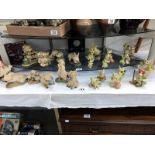 A collection of over 20 pocket dragons and Piggin figurines