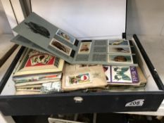 A quantity of cigarette cards and tea card albums and contents