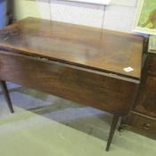 A mahogany Pembroke table.