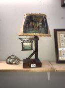 An unusual music box/lamp with hunting theme shade