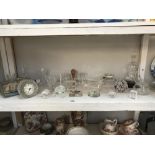 A collection of crystal items, glass items, paperweights and ships in bottles etc.