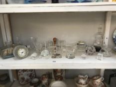 A collection of crystal items, glass items, paperweights and ships in bottles etc.