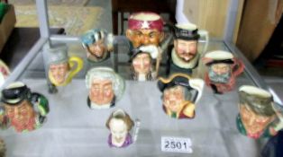 8 miniature Royal Doulton character jugs including The Falconer.