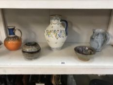 A quantity of pottery items