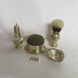 A silver pin cushion trinket box, a silver shaving brush,