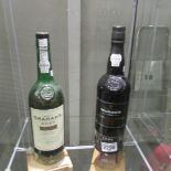 A bottle of W & J Graham's fine tawny port and a Warre's 1999 LBV port.