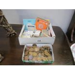 A mixed lot of British pre-decimal copper coins, tea, weetabix cards and Webley,