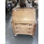 A 1930's oak ply bureau