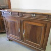 A large 2 door cupboard.