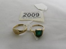 A 9ct gold ring set green stone, size K and a 9ct gold signet ring, size M.