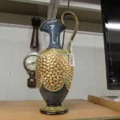 A Doulton salt glaze ewer.