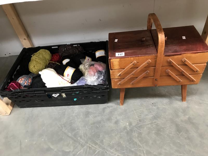 A sewing box and box of assorted wool