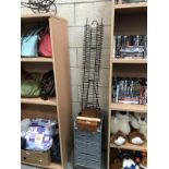 A box of bowls (inside a/f) filing drawer cabinet and a Dvd rack