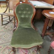 A mahogany framed ladies chair.