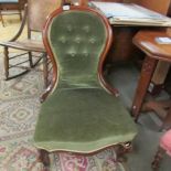 A mahogany framed ladies chair.