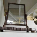 A Victorian mahogany toilet mirror.