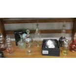A mixed lot of glass scent bottles etc.