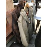 A faux fur coat and a re-styled fur coat