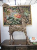 A large reed/wicker deer