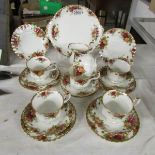 A Royal Albert Old Country Roses tea set (missing sugar bowl) with original box.