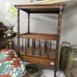 A mahogany table with Canterbury base.