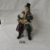 A Royal Doulton figurine, The Coachman.