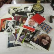 A mixed lot of celebrity photographs, some signed and 3 autograph books.