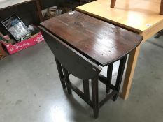 An oak gateleg table