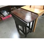 An oak gateleg table