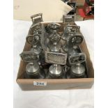 A box of pewter Christmas bells