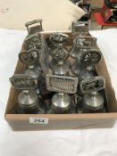 A box of pewter Christmas bells