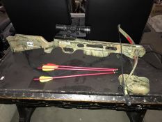 A Jaguar crossbow with sights & 3 red/yellow bolts