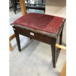 A vintage piano stool