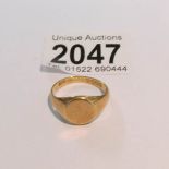 An 18ct gold signet ring, size Q. approximately 7 grams.