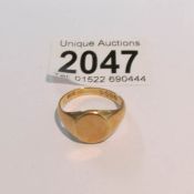 An 18ct gold signet ring, size Q. approximately 7 grams.