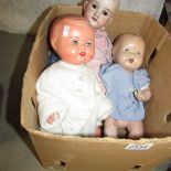 A porcelain headed doll a/f and 2 vintage dolls.