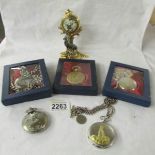A pocket watch on stag stand and 5 other pocket watches.