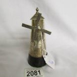 A silver windmill pepper pot,. circa 1900.