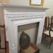 A Victorian Coalbrookdale cast iron fire surround.